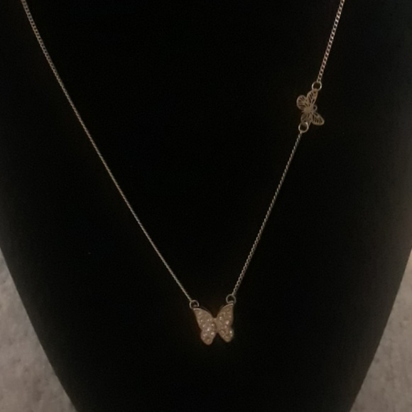 Jewelry - flyaways small  butterfly  gold necklace